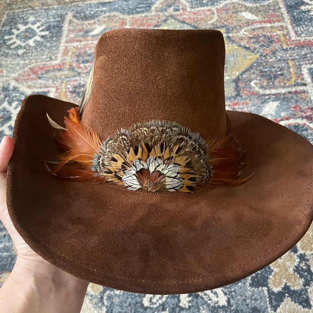 Handcrafted Leather Hat with Feather Accents